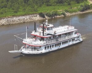 a river boat floats on the Mississippi River